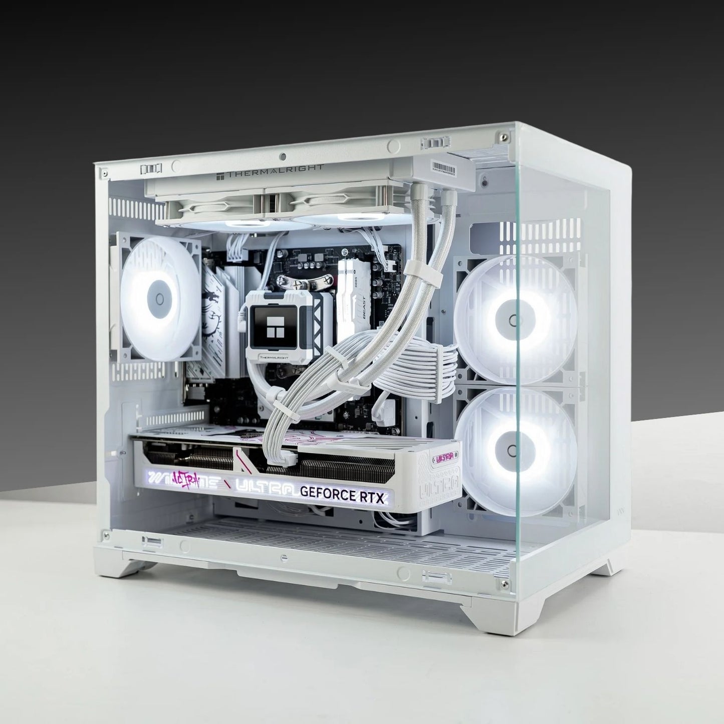 Infinity Mini high-performance PC with AMD Ryzen 5 7600X, GeForce RTX 5070, and Tecware VXN Evo casing in white, showcasing sleek design.