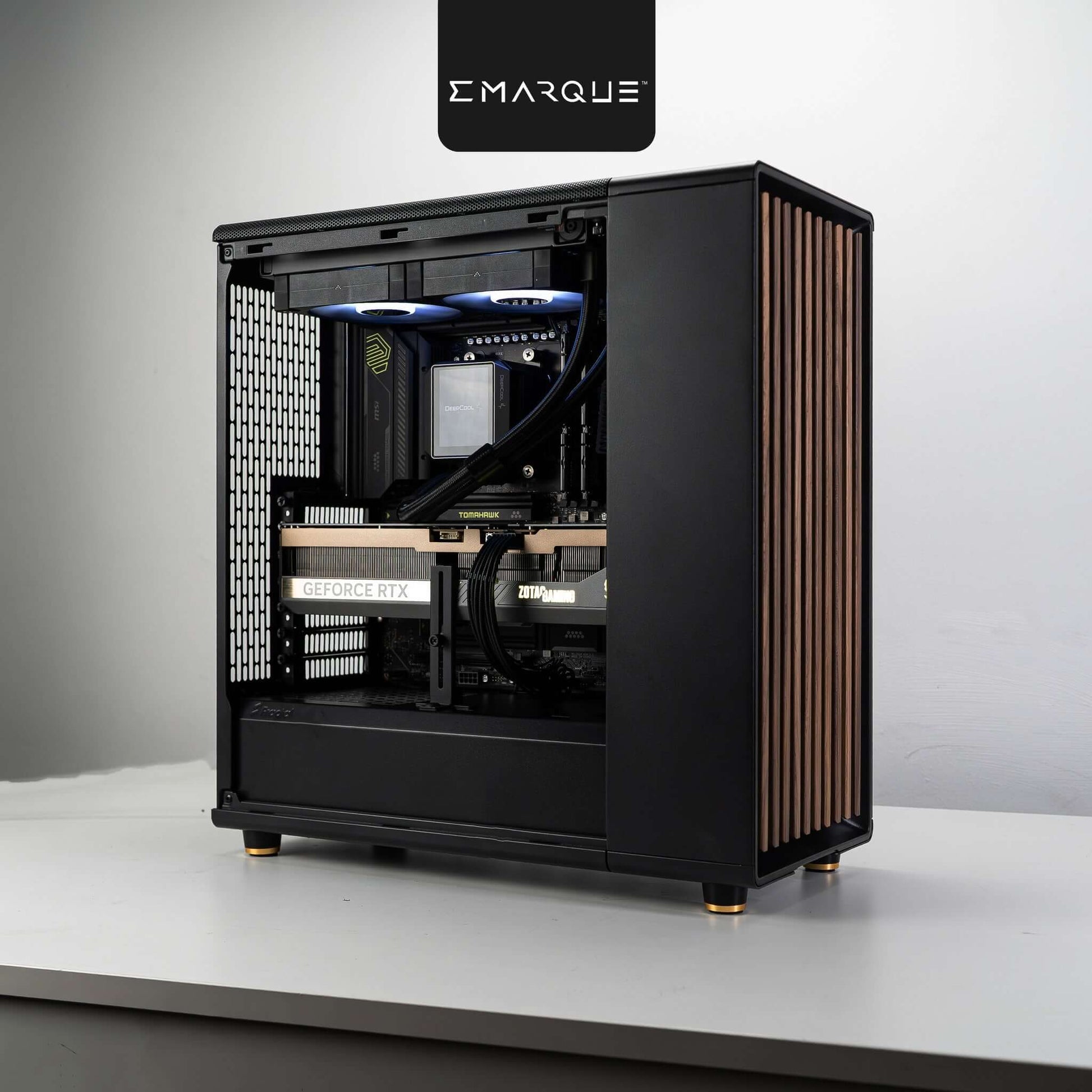 AMD Ryzen 7 9800X3D PC build with GeForce RTX 5070 Ti in Fractal Design North Charcoal Black case, shown on a desk.