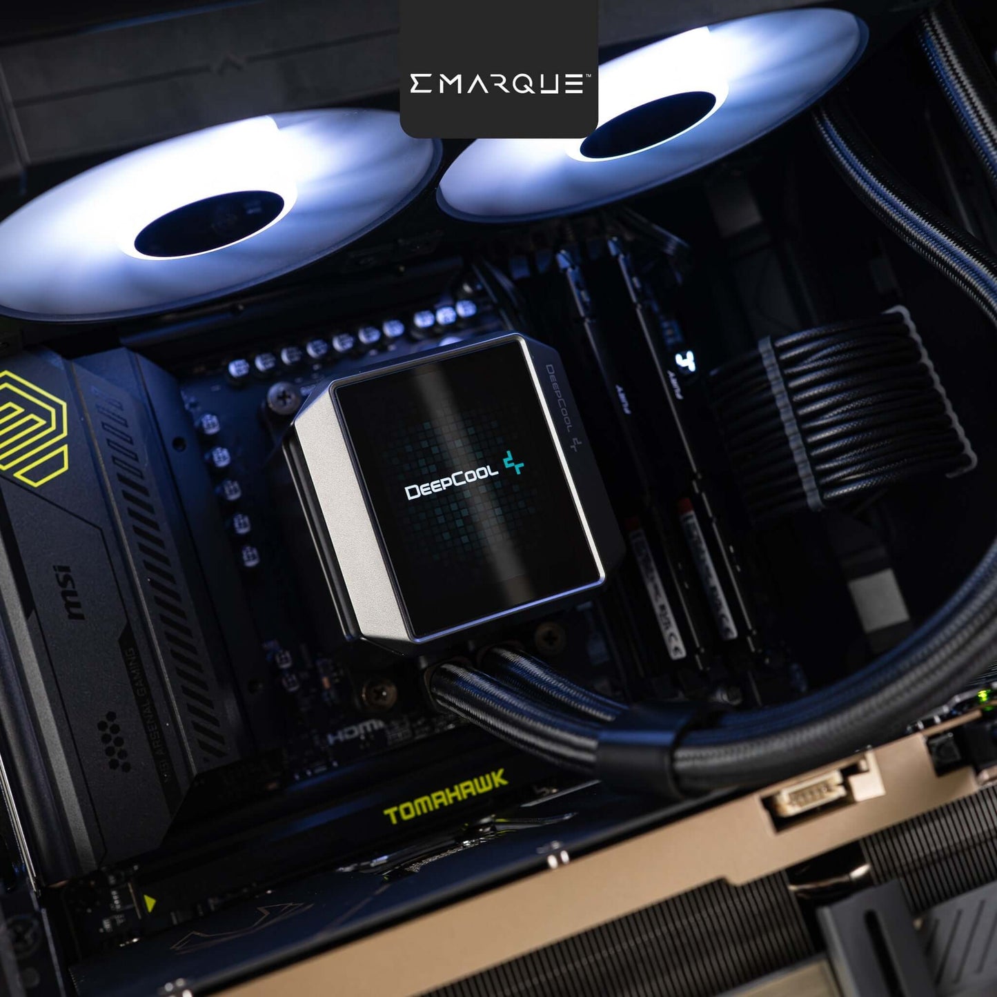 Close-up of MSI TOMAHAWK motherboard with Deepcool cooling in a high-performance PC build by Emarque.