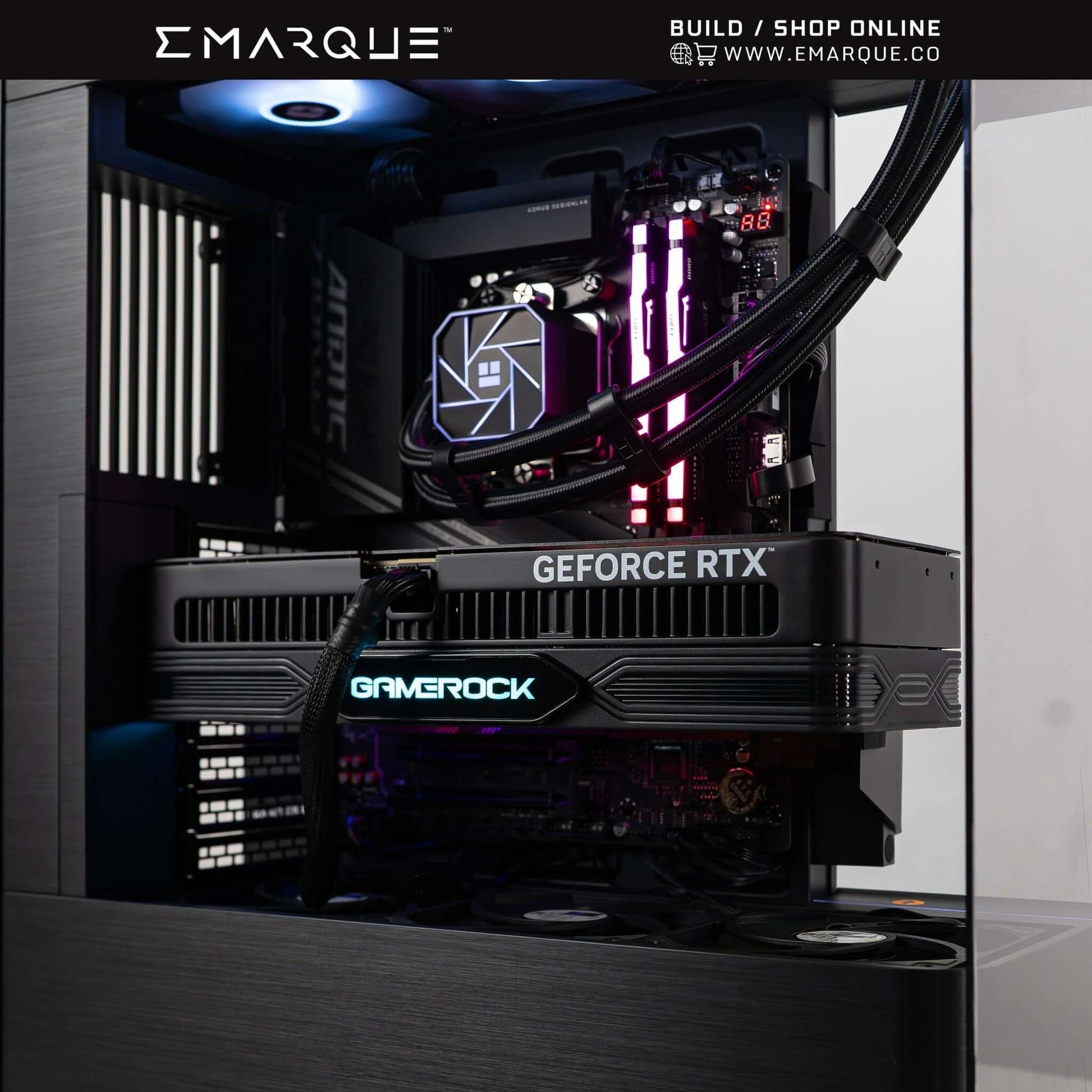EMARQUE gaming PC with AMD Ryzen 7, GeForce RTX 5070 TI GPU, and RGB lighting inside a Phanteks Evolv X2 case.