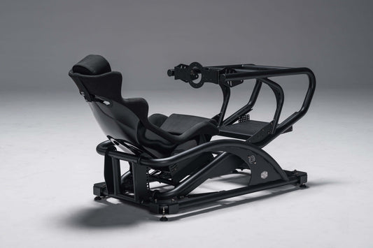 DynX Racing Simulator EMARQUE x Cooler Master setup, black ergonomic design for immersive virtual racing experience.
