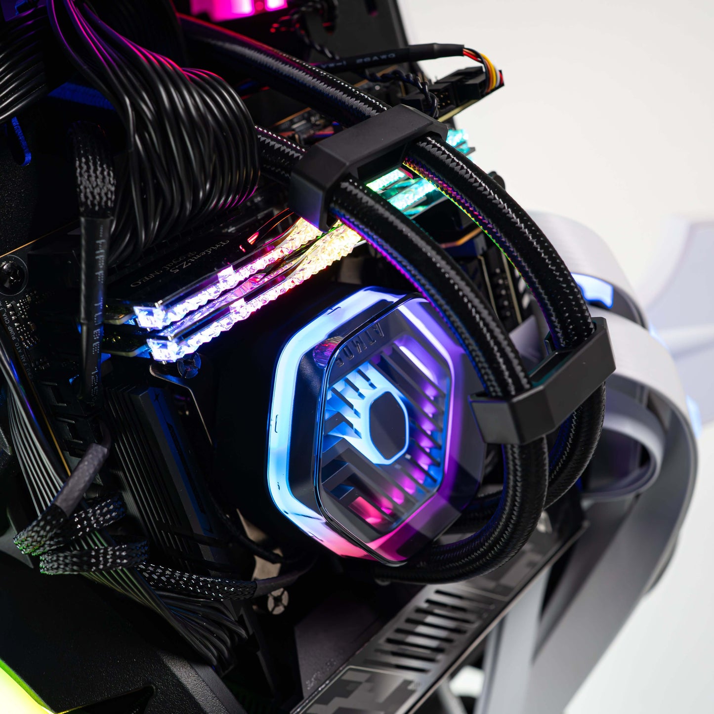 APEX Shark X PC with Intel Core Ultra 9 285K and GeForce RTX 5080, showcasing sleek cables and vibrant LED lighting.