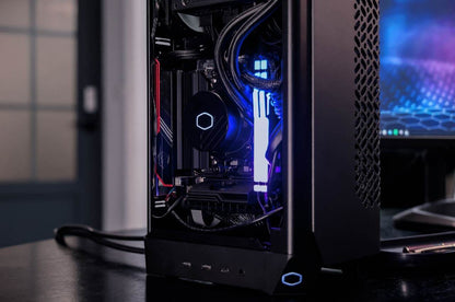 Cooler Master NCORE PC for racing simulation with RGB lighting, showcasing high-performance components for immersive gaming.