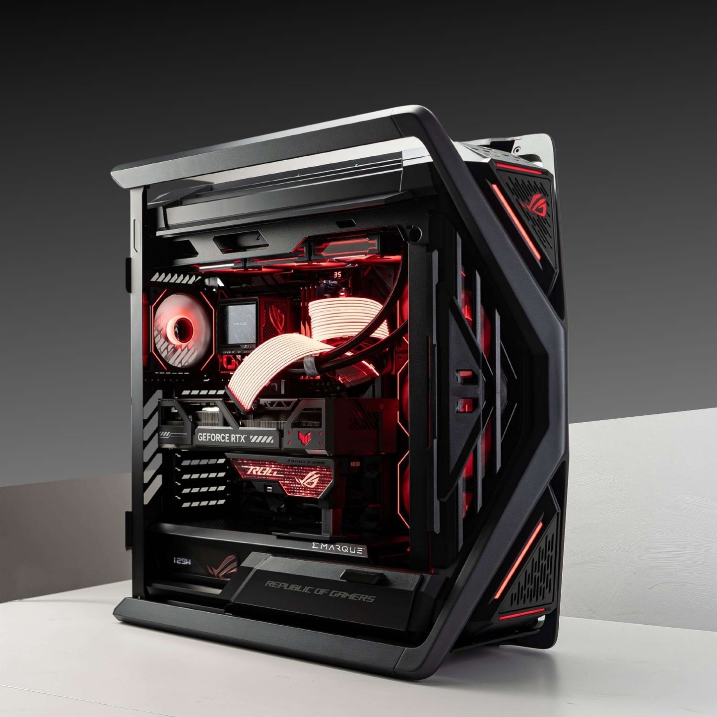 ASUS ROG Hyperion GR701 Gaming PC with AMD Ryzen 7 9800X3D and ROG Astral RTX 5080, featuring stylish black chassis and red LED lighting