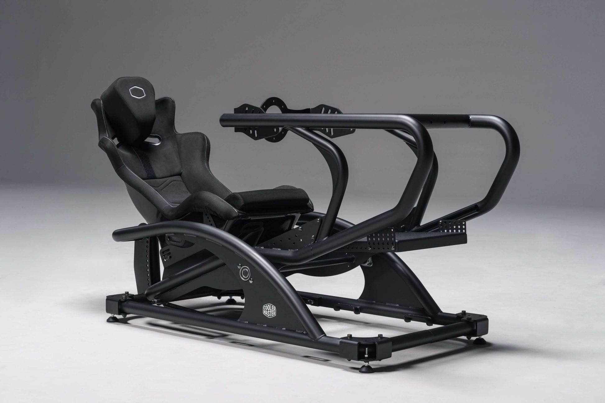 DynX Racing Simulator NCORE PC GM27-CQS x3 setup with ergonomic racing seat and sturdy frame for immersive sim racing experience.