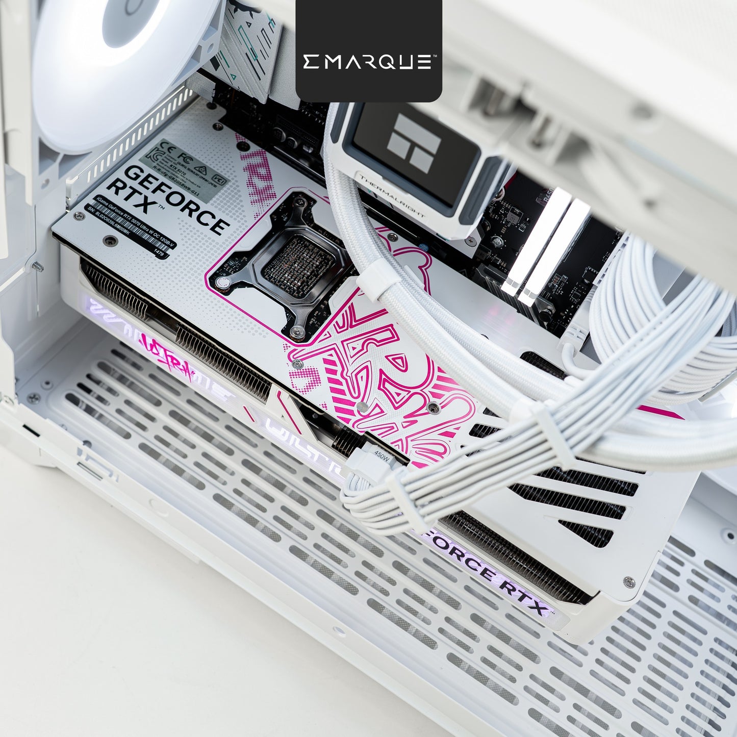 Close-up of INFINITY MINI PC build with GeForce RTX 5070, white cabling, and Tecware VXN Evo Omni ARGB casing.