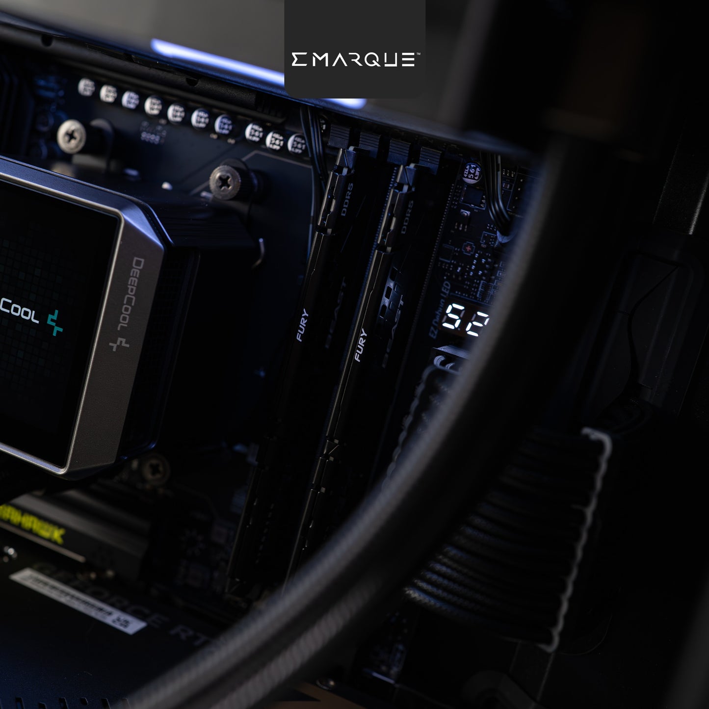 Close-up view of a computer motherboard showing Kingston FURY RAM and Deepcool components, with illuminated details.