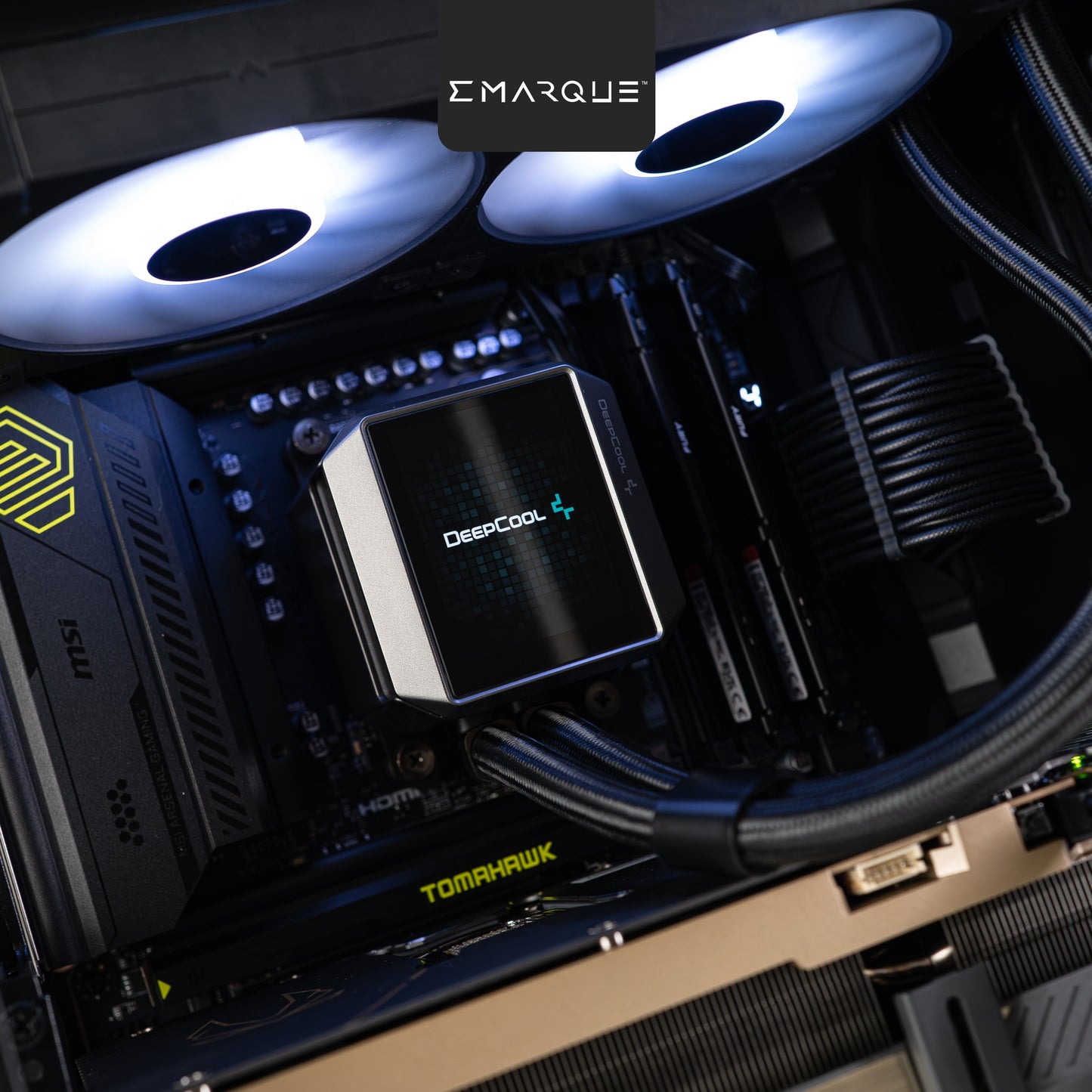 Close-up of MSI TOMAHAWK motherboard with Deepcool cooling in a high-performance PC build by Emarque.