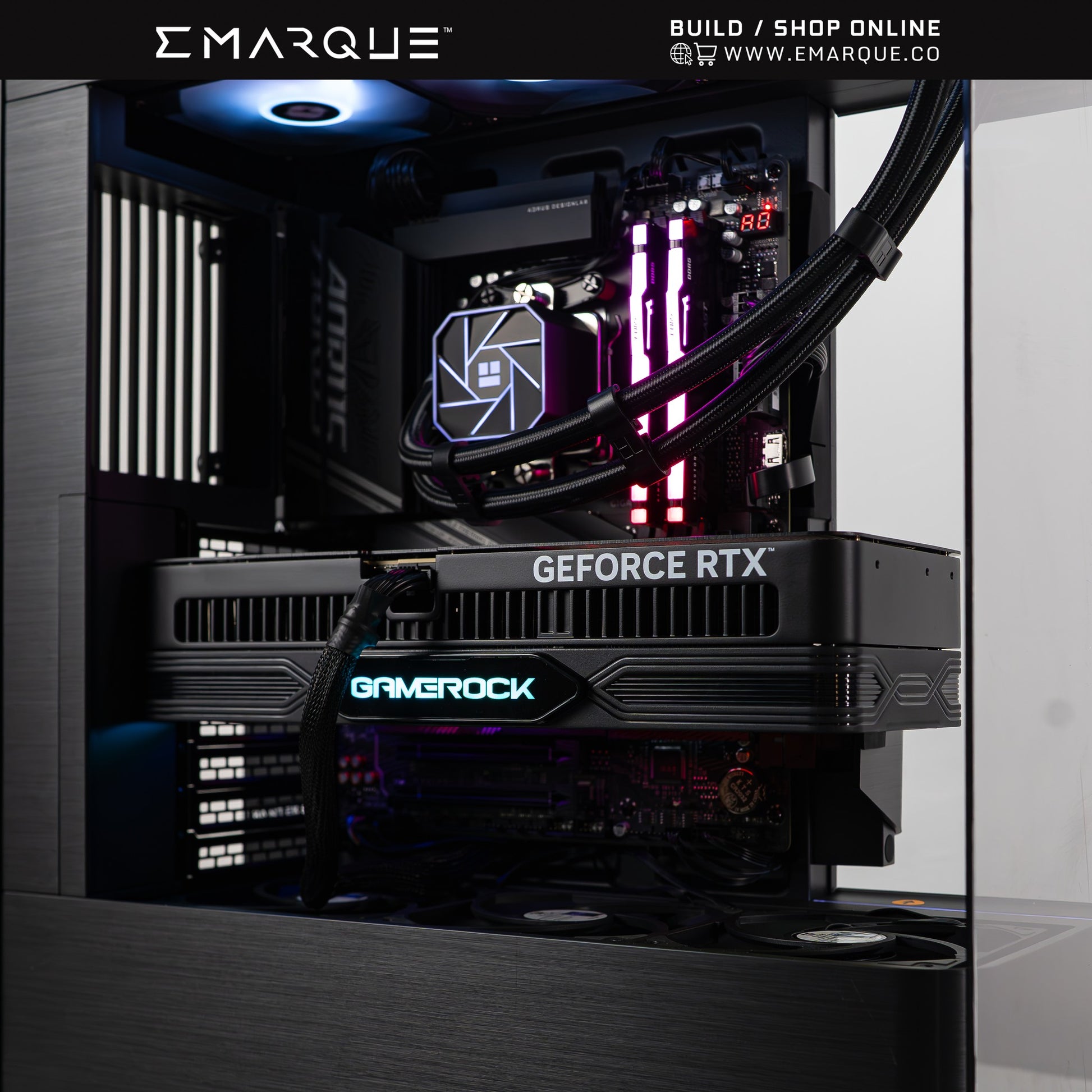 EMARQUE gaming PC with AMD Ryzen 7, GeForce RTX 5070 TI GPU, and RGB lighting inside a Phanteks Evolv X2 case.
