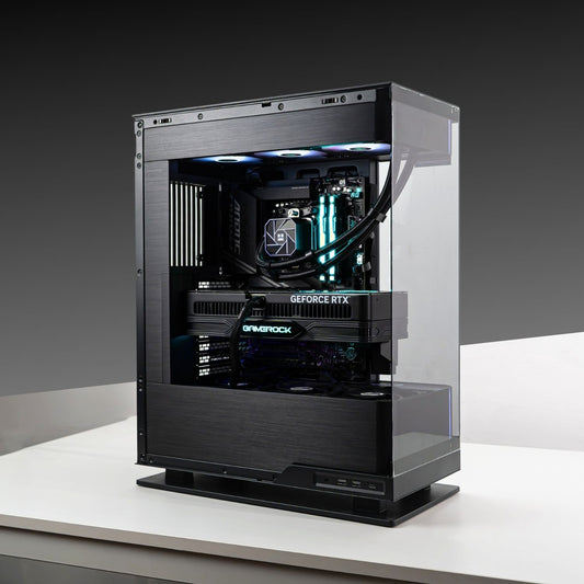 EVOLV PC featuring AMD Ryzen 7 7800X3D, GeForce RTX 5070 TI, in PHANTEKS EVOLV X2 TG DRGB chassis, on white desk.