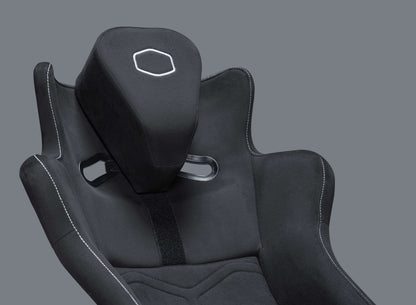 Close-up of DynX Racing Simulator seat with black fabric and ergonomic design.