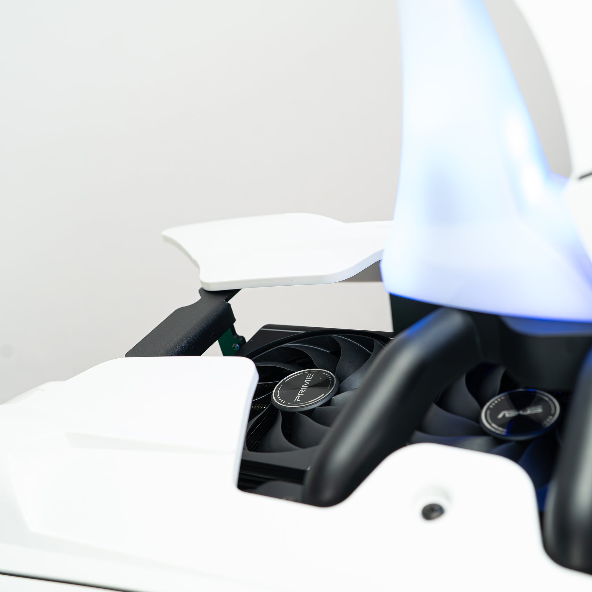 Close-up of APEX Shark X PC cooling fans with sleek, futuristic design and LED lighting highlighting premium components.