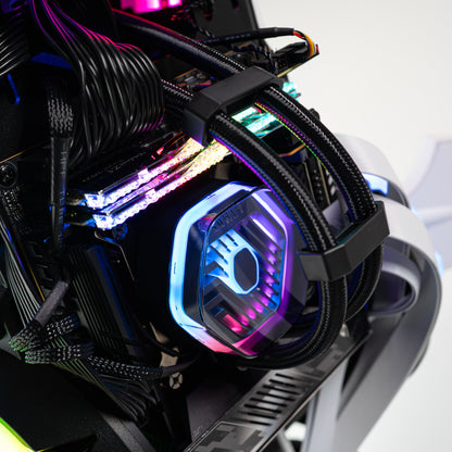 APEX Shark X PC with Intel Core Ultra 9 285K and GeForce RTX 5080, showcasing sleek cables and vibrant LED lighting.
