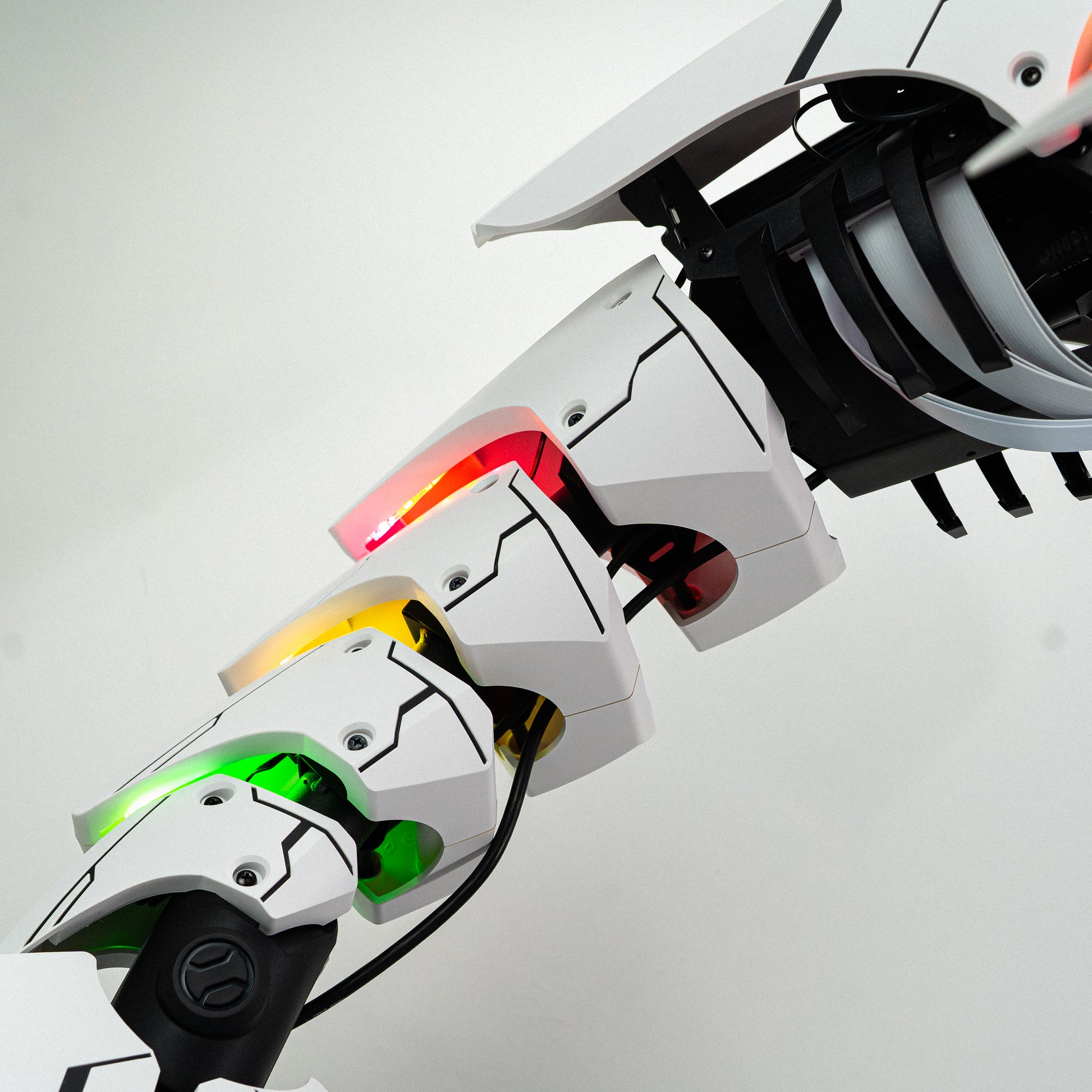 Close-up of APEX Shark X PC with RGB lighting and futuristic design.