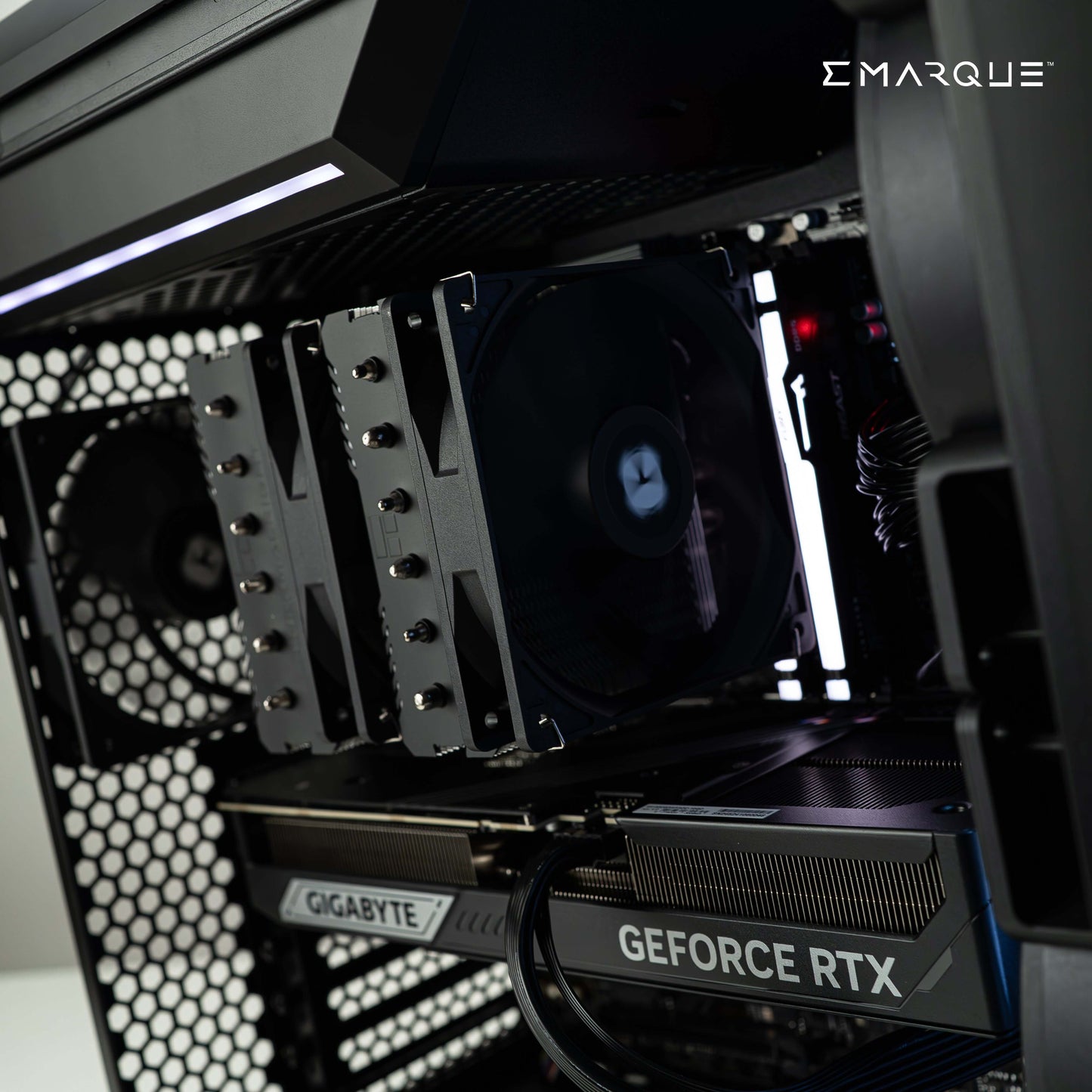 High-performance gaming PC setup with AMD Ryzen 7 9800X3D CPU and GeForce RTX 5080 GPU, featuring advanced cooling and RGB elements.