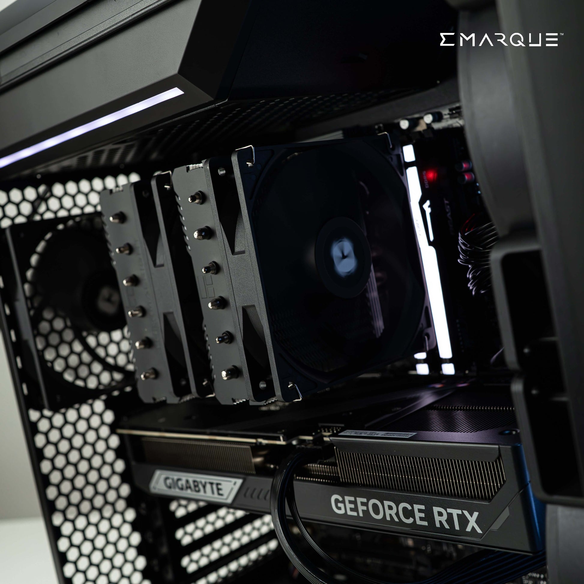 High-performance gaming PC setup with AMD Ryzen 7 9800X3D CPU and GeForce RTX 5080 GPU, featuring advanced cooling and RGB elements.