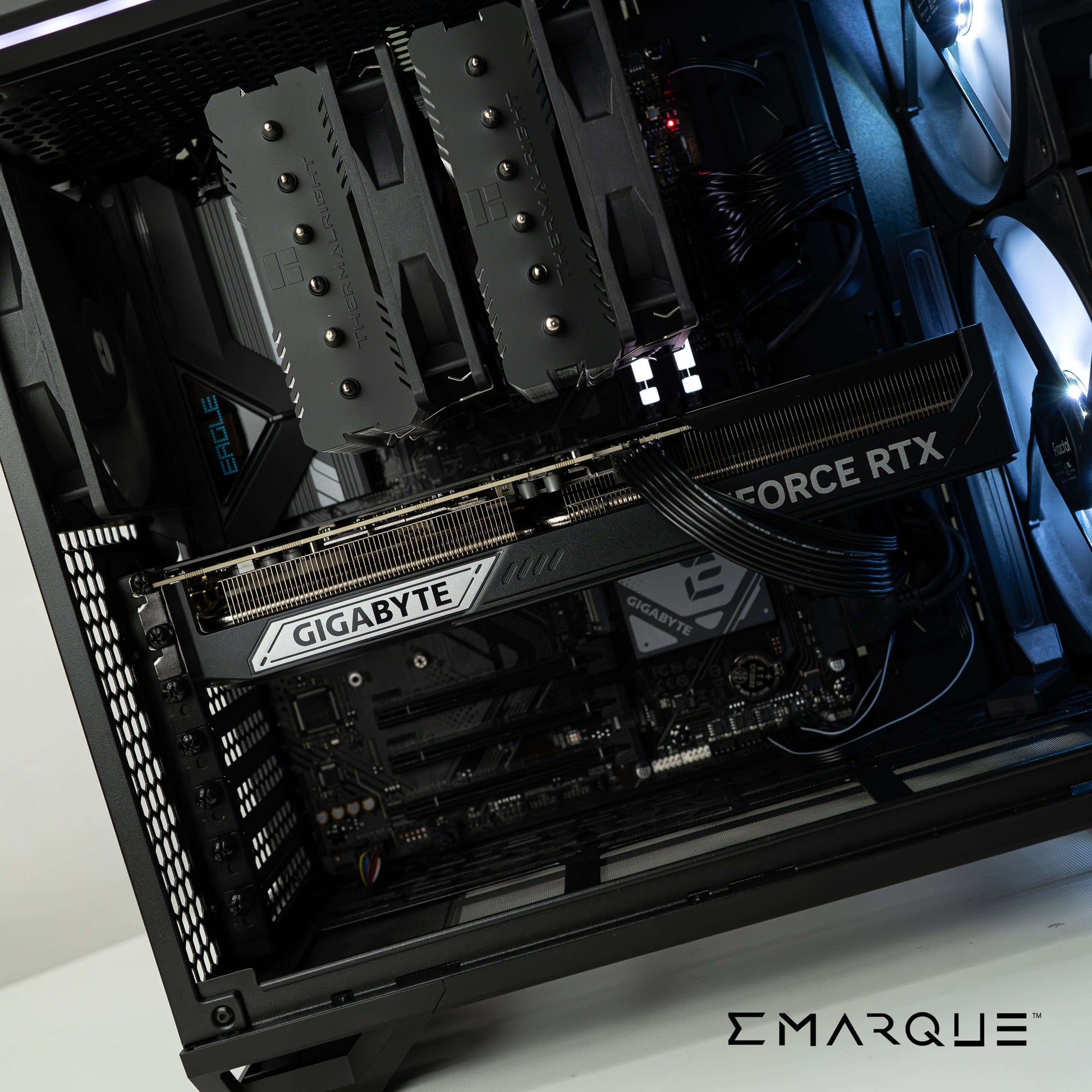 Powerful PC build with GIGABYTE GeForce RTX 5080 and AMD Ryzen 7 9800X3D in Fractal Design case featuring RGB lighting.