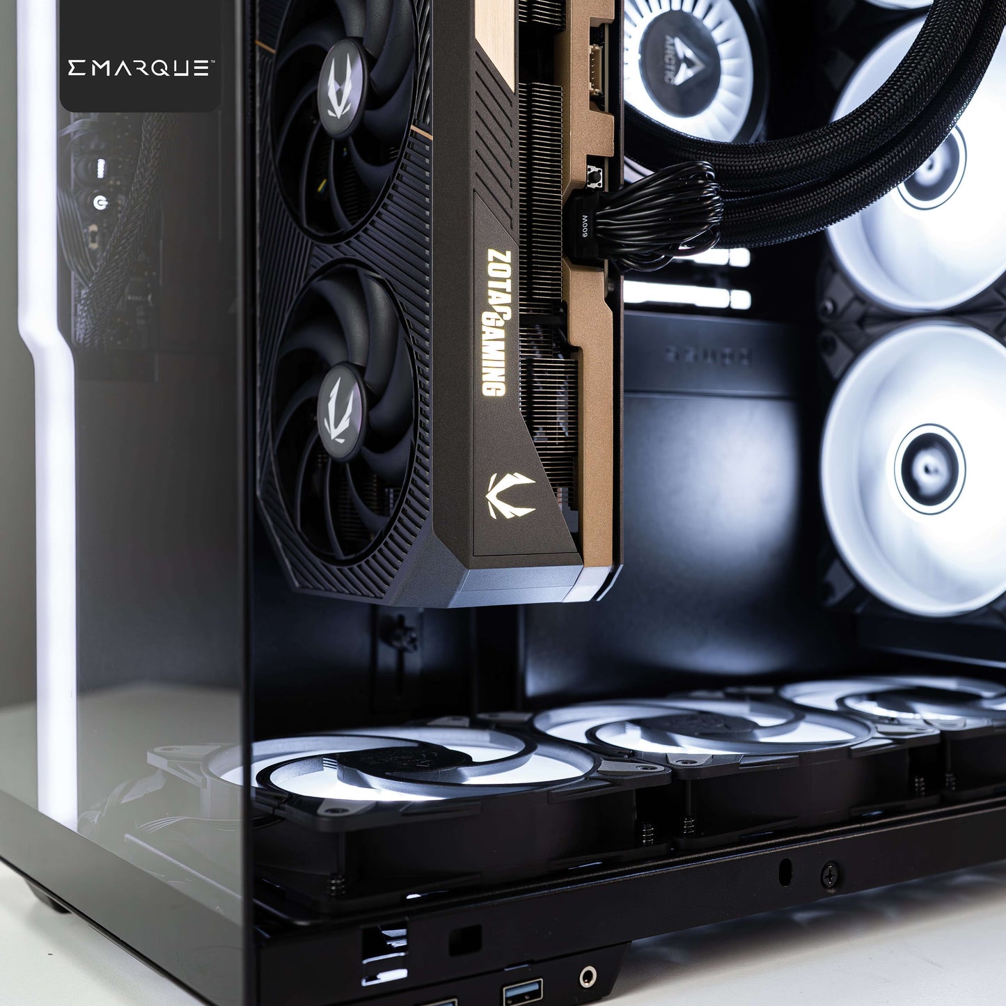 Close-up of EMARQUE Xhuttle PC with ZOTAC GAMING GeForce RTX 5090 GPU inside SSUPD Xhuttle Dual Chamber ATX Case.