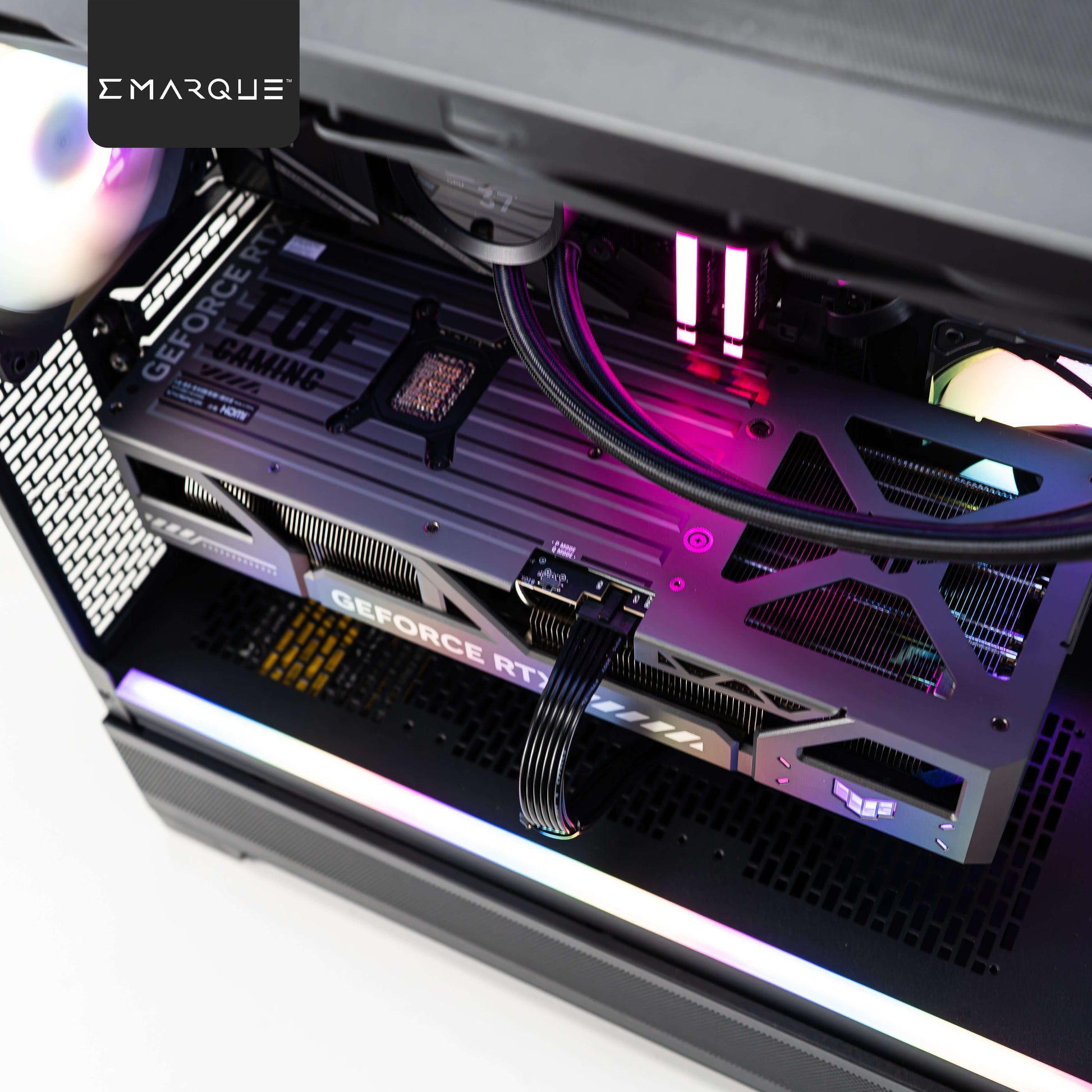 Infinity XT Gaming PC interior featuring ASUS TUF Gaming GeForce RTX 5080 GPU with vibrant RGB lighting in Phanteks XT View case.