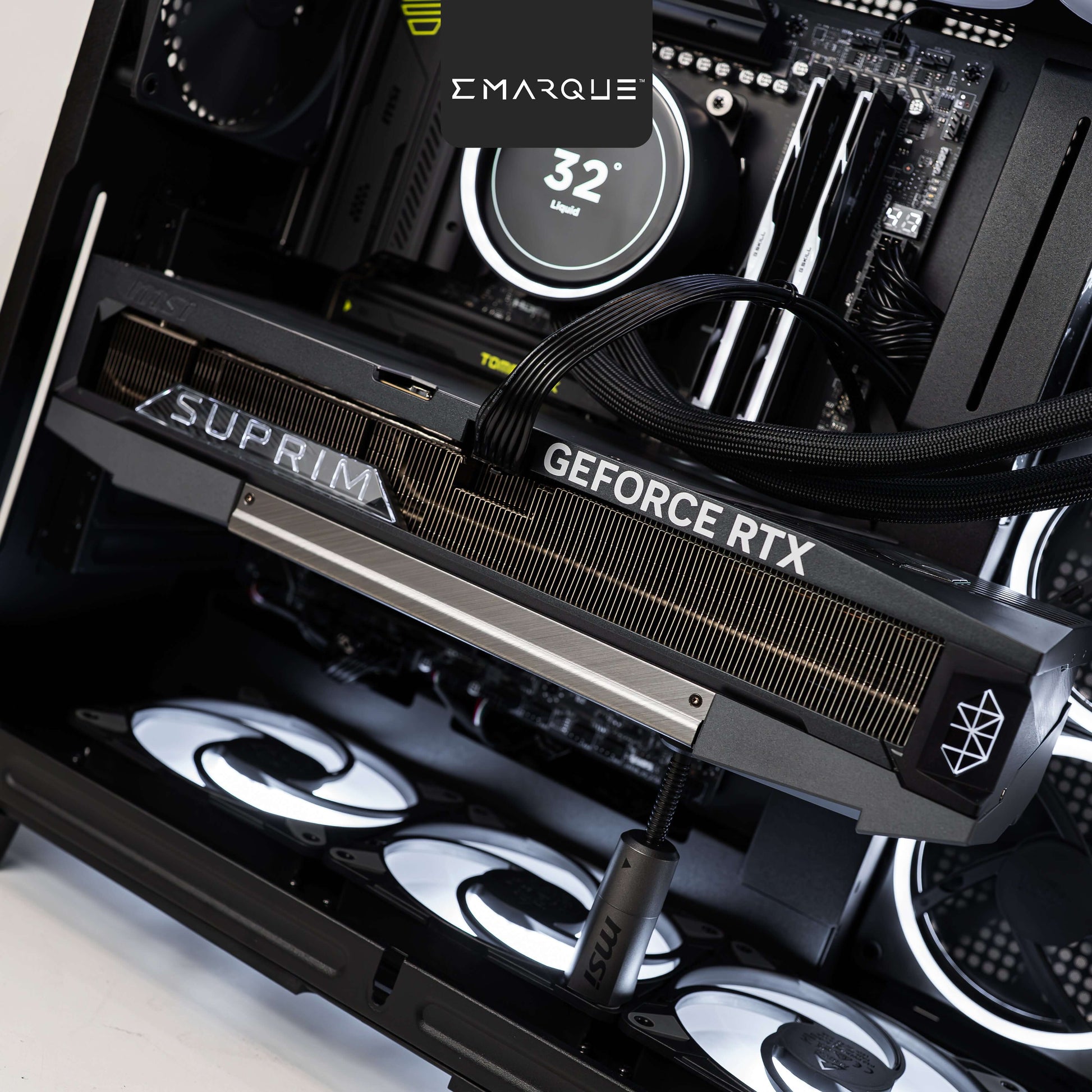 Close-up of a MSI GeForce RTX 5090 Suprim graphics card inside a black NZXT H9 Elite mid-tower case.