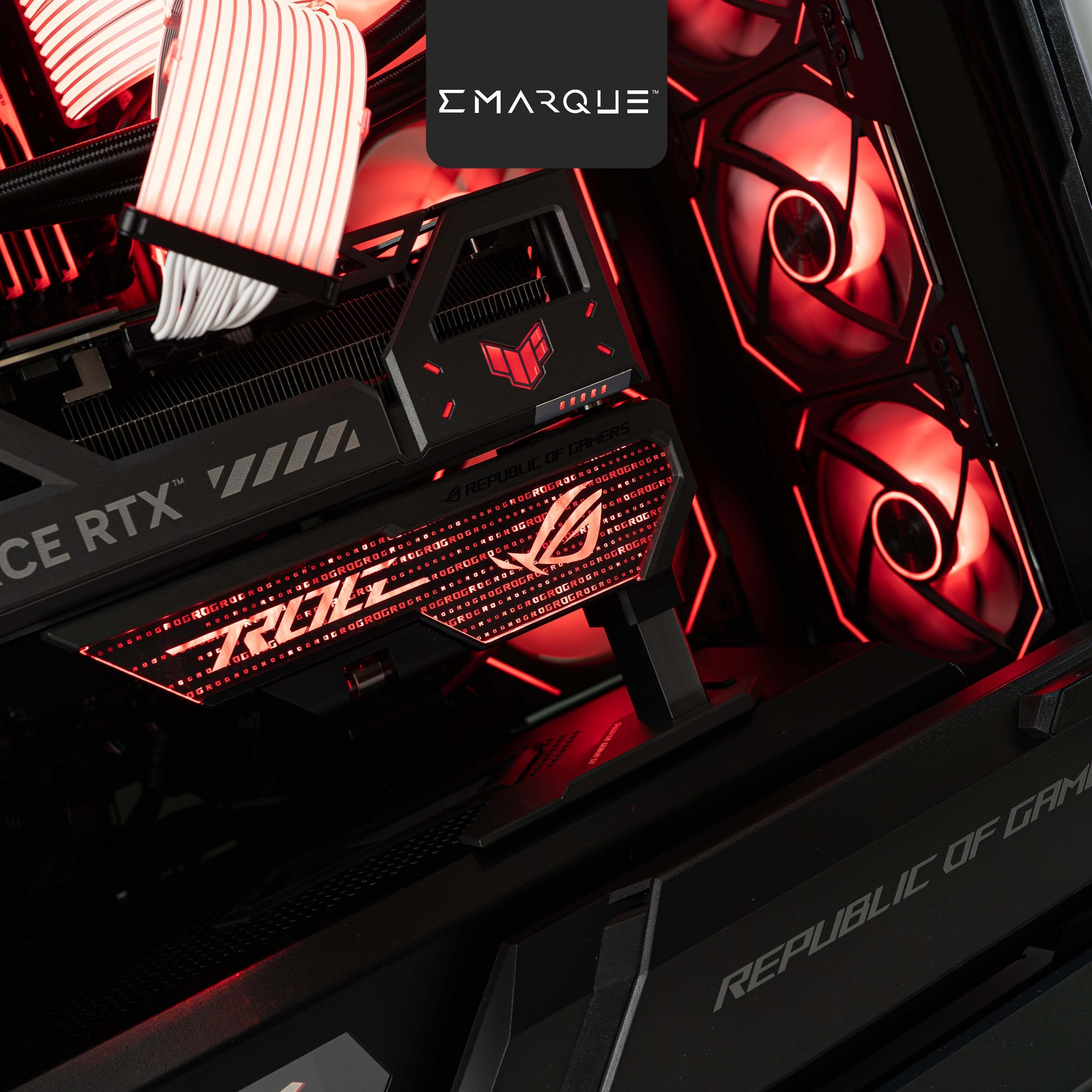 ASUS ROG gaming PC interior with glowing red LED lights and AMD components, showcasing gaming technology.