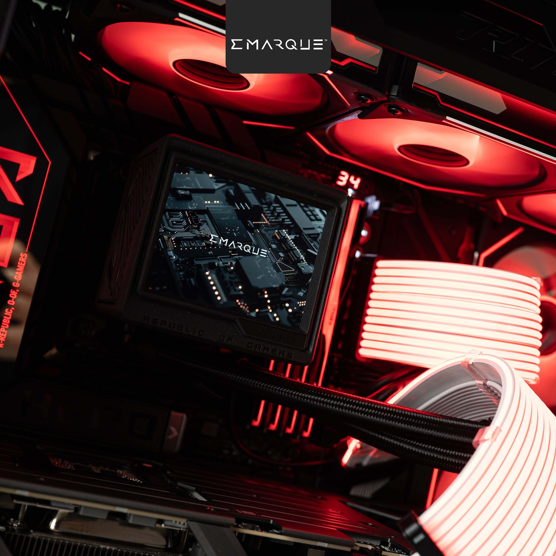 Close-up of a gaming PC interior with vibrant red lighting, showcasing advanced cooling systems and technology components.