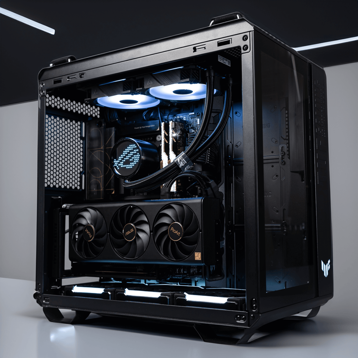 TUF GT Gaming PC with dual-chamber design featuring AMD Ryzen 7 9800X3D and ASUS TUF GeForce RTX 5080, offering high-speed visuals.