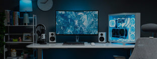 EMARQUE custom gaming PC build on a desk with monitor and peripherals